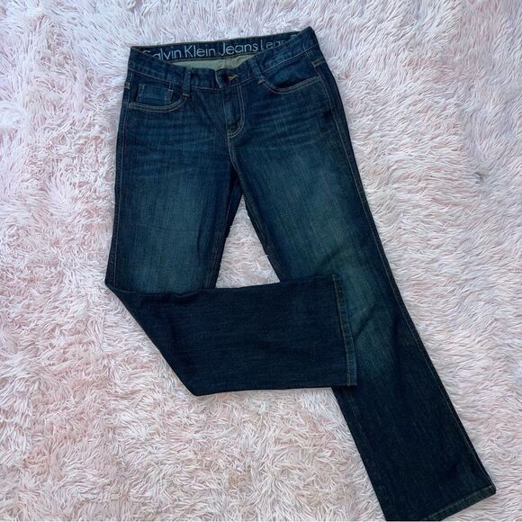 Calvin Klein Women's Lean Boot Jeans Snap Flap pockets EUC size 27/4 - Picture 1 of 11